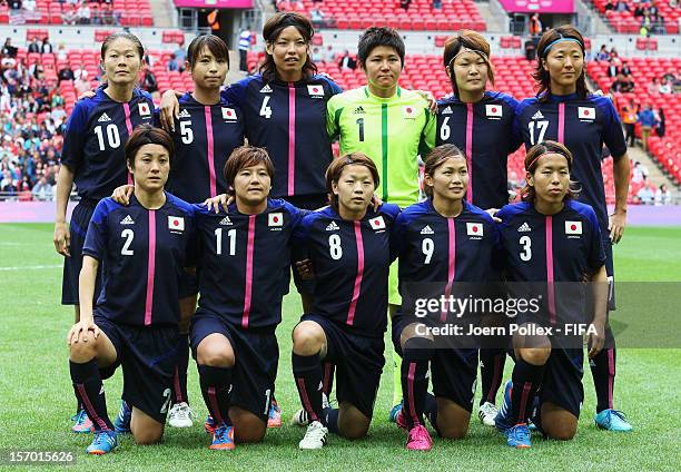The team of Japan is pictured prior to the Women's Football Semi Final match between France and Japan on Day 10 of the London 2012 Olympic Games at...