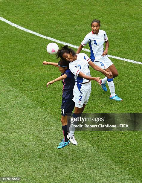 Wendie Renard of France is challenged by Yuki Ogimi of Japan during the Women's Football Semi Final match between France and Japan on Day 10 of the...