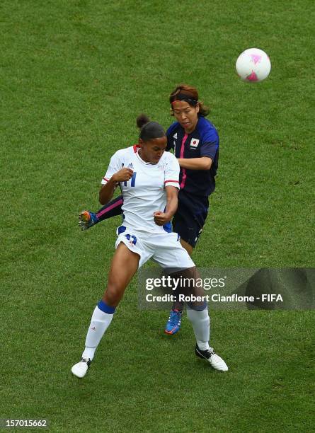 Marie-Laure Delie of France is challenged by Azusa Iwashimizu of Japan during the Women's Football Semi Final match between France and Japan on Day...