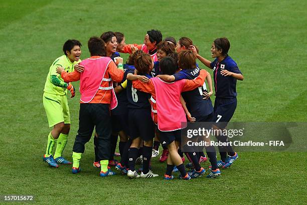 Japan celebrate after they defeated France at the Women's Football Semi Final match between France and Japan on Day 10 of the London 2012 Olympic...