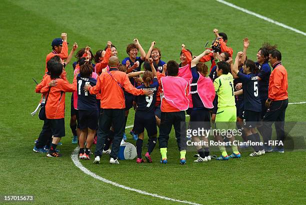 Japan celebrate after they defeated France at the Women's Football Semi Final match between France and Japan on Day 10 of the London 2012 Olympic...