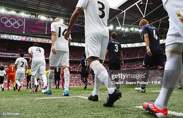 Both teams are seen on their way to the pitch prior to the Men's Football Semi Final match between Mexico and Japan, on Day 11 of the London 2012...