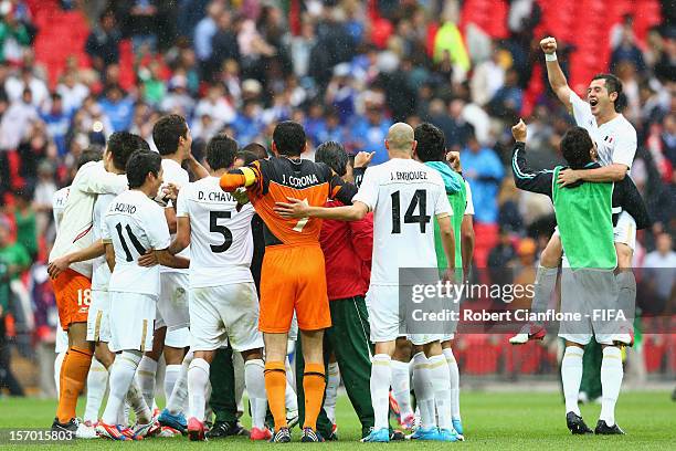 Mexico celebrate after they defeated Japan at the Men's Football Semi Final match between Mexico and Japan, on Day 11 of the London 2012 Olympic...