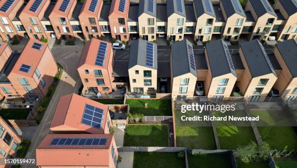 solar powered housing - environmental conservation stock pictures, royalty-free photos & images