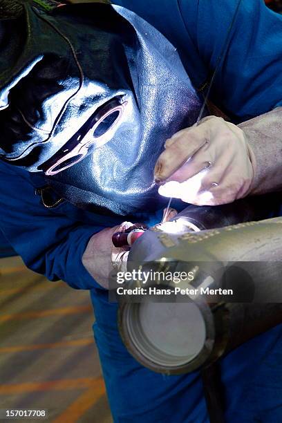welder at work - hot works stock pictures, royalty-free photos & images