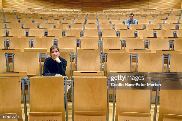 two students at auditorium - lecture theatre stock-fotos und bilder