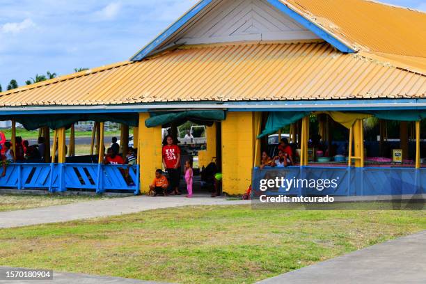 people at the vaiaku maneapa - community house, funafuti atoll, tuvalu - tuvalu stock pictures, royalty-free photos & images
