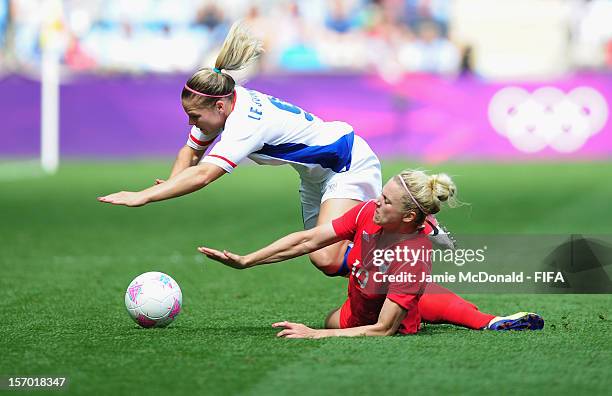 Lauren Sesselmann of Canada battles with Eugenie le Sommer of France during the Women's Football Bronze Medal match between Canada and France, on Day...