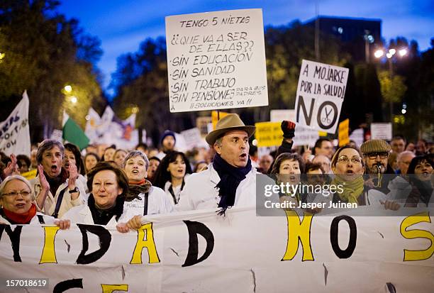 Health workers shout during a demonstration held on the second day of a two day general strike on November 27, 2012 in Madrid, Spain. For the first...