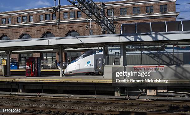 An Amtrak Acela express train on November 23, 2012 heads to Washington, DC's Union Station in New Haven, Connecticut.