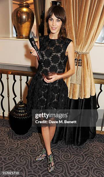 Alexa Chung, winner of the British Style award supported by Vodafone, poses with award at the British Fashion Awards 2012 at The Savoy Theatre on...