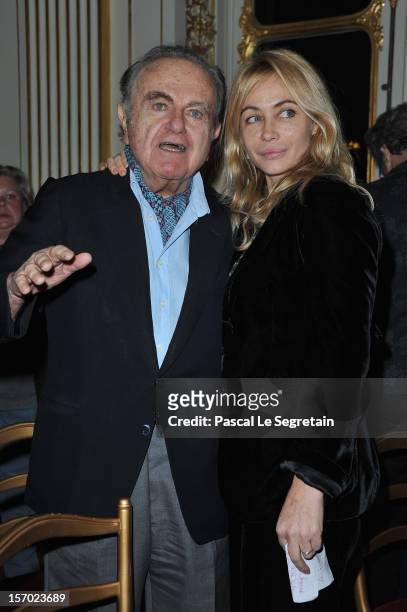 Emmanuelle Beart poses with her father Guy Beart at Ministere de la Culture on November 27, 2012 in Paris, France.