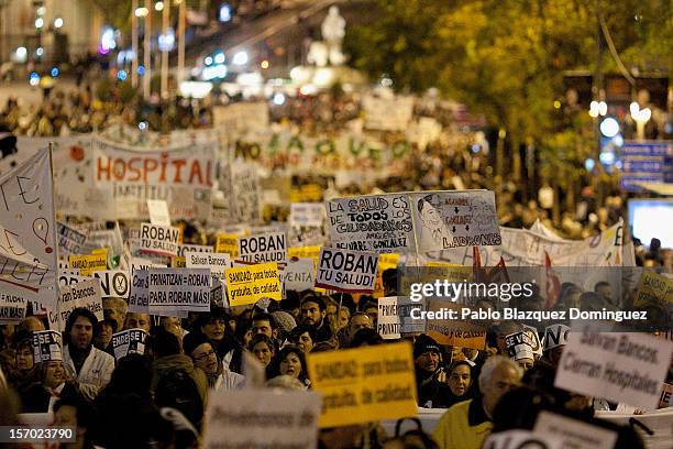 Protesters walk along Alcala Street amid other health workers during a demonstration held on the second day of a two-day general strike on November...