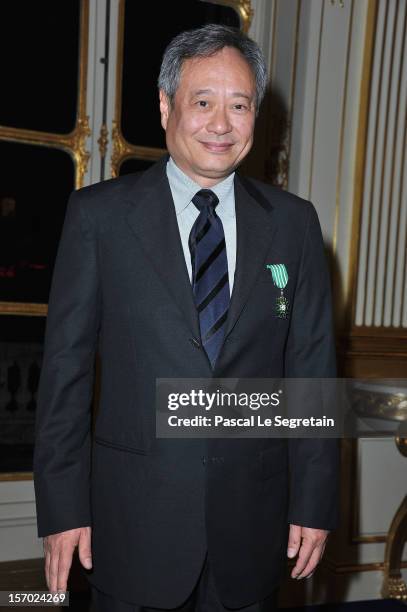 Director Ang Lee poses after being honored the Officer des Arts et des Lettres at Ministere de la Culture on November 27, 2012 in Paris, France.