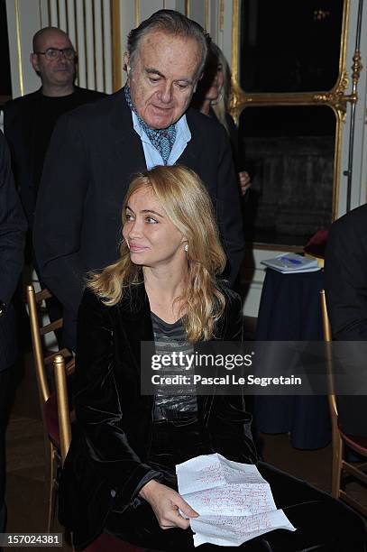 Emmanuelle Beart poses with her father Guy Beart at Ministere de la Culture on November 27, 2012 in Paris, France.