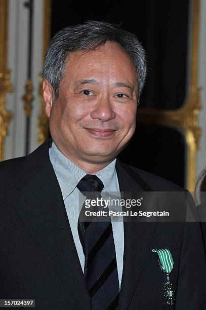 Director Ang Lee poses after being honored the Officer des Arts et des Lettres at Ministere de la Culture on November 27, 2012 in Paris, France.