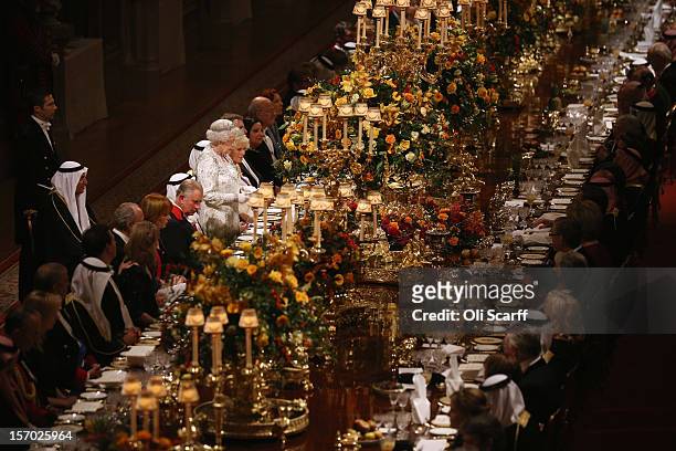 Queen Elizabeth II delivers a speech during a State Banquet for His Highness the Amir Sheikh Sabah Al-Ahmad Al-Jaber Al-Sabah of Kuwait in Windsor...