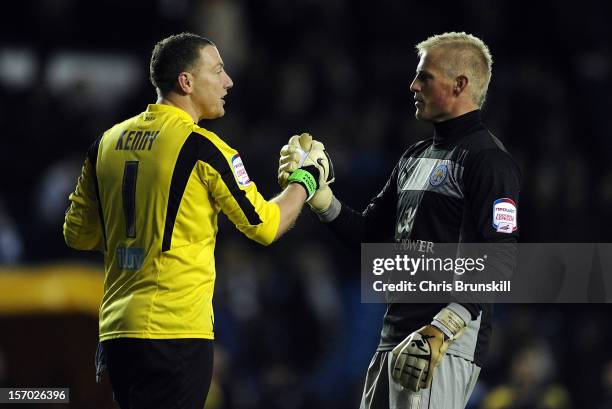 Kasper Schmeichel of Leicester City shakes hands with Paddy Kenny of Leeds United at full-time following the npower Championship match between Leeds...