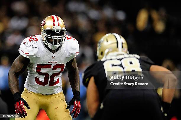 Patrick Willis of the San Francisco 49ers stands across from William Robinson of the New Orleans Saints during a game at the Mercedes-Benz Superdome...