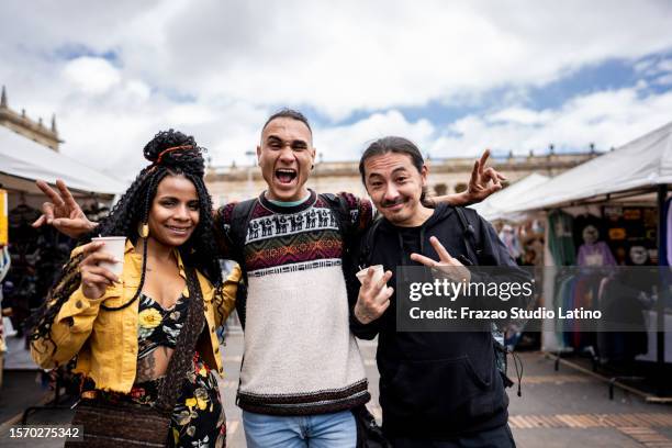 portrait of friends in historic district of bogota, colombia - colombian culture stock pictures, royalty-free photos & images