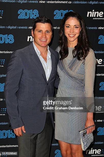 Shane Crawford and Giaan Rooney pose as they arrive at the Nine 2013 program launch at Myer on November 28, 2012 in Melbourne, Australia.