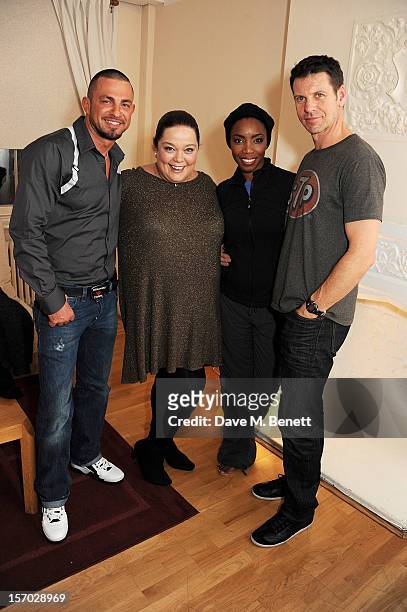 Robin Windsor and Lisa Riley visit cast members Heather Headley and Lloyd Owen backstage at the West End production of 'The Bodyguard' at Adelphi...