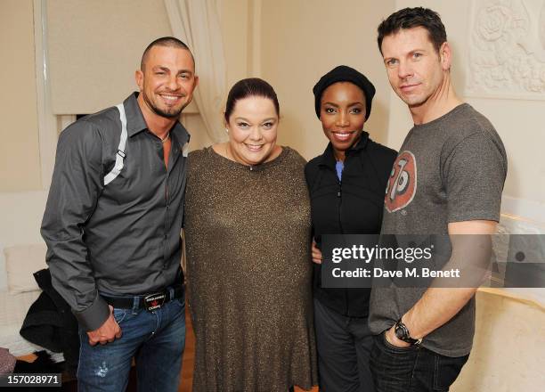 Robin Windsor and Lisa Riley visit cast members Heather Headley and Lloyd Owen backstage at the West End production of 'The Bodyguard' at Adelphi...