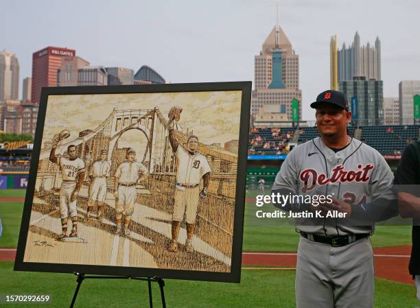 Miguel Cabrera of the Detroit Tigers is honored before the game with a painting against the Pittsburgh Pirates at PNC Park on August 1, 2023 in...