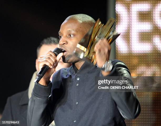 French rap singer Abd Al Malik delivers a speech after winning an award in the category "Urban music" for his hip hop "Cahteau Rouge" during the 1st...