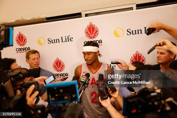 August 1 - Shai Gilgeous-Alexander of Canada's men's basketball team speaks to the media during the FIBA Men's Basketball World Cup training camp at...