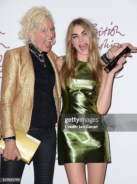 Ellen Von Unwerth and Cara Delevingne, winner of the Best Model award pose in the awards room at the British Fashion Awards 2012 at The Savoy Hotel...