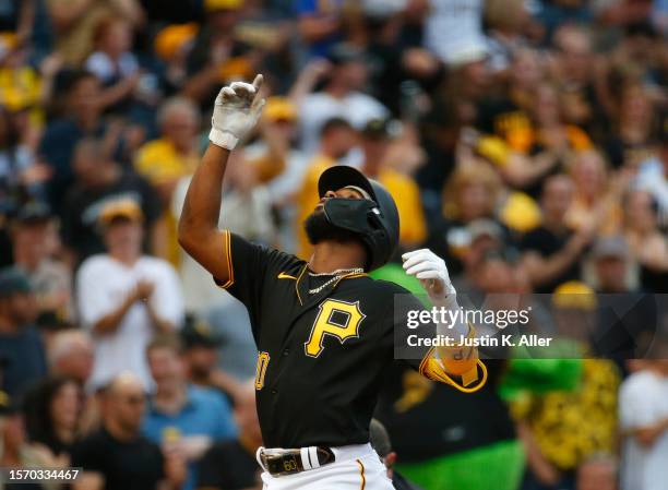 Liover Peguero of the Pittsburgh Pirates reacts after hitting a two run home run in the second inning against the Detroit Tigers during inter-league...