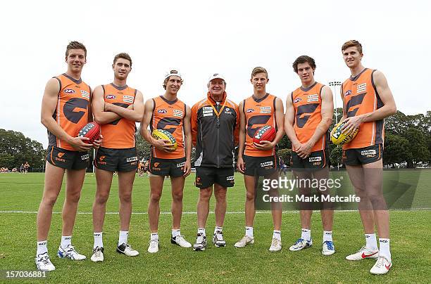 Coach Kevin Sheedy poses with new draft players Aidan Corr, Christian Jaksch, Jonathan O'Rouke, Lachie Whitfield, Lachie Plowman and James Stewart...