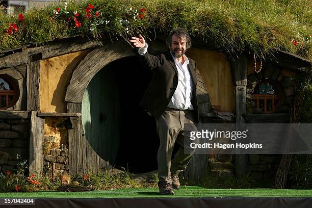 Director Peter Jackson emerges from from a Hobbit house before delivering a speech at the "The Hobbit: An Unexpected Journey" World Premiere at...