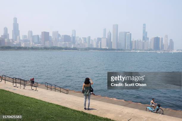 Smoke from Canadian wildfires obscures the skyline on July 25, 2023 in Chicago, Illinois. The smoke has the city ranked fourth for the worst air...