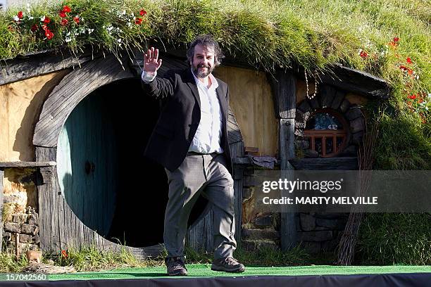 Director Peter Jackson walks out onto the stage during the world premiere of "The Hobbit" movie in Courtenay Place in Wellington on November 28,...