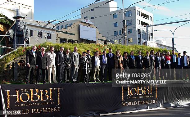 Members of the cast pose on stage together at the world premiere of "The Hobbit" movie in Courtenay Place in Wellington on November 28, 2012. Huge...