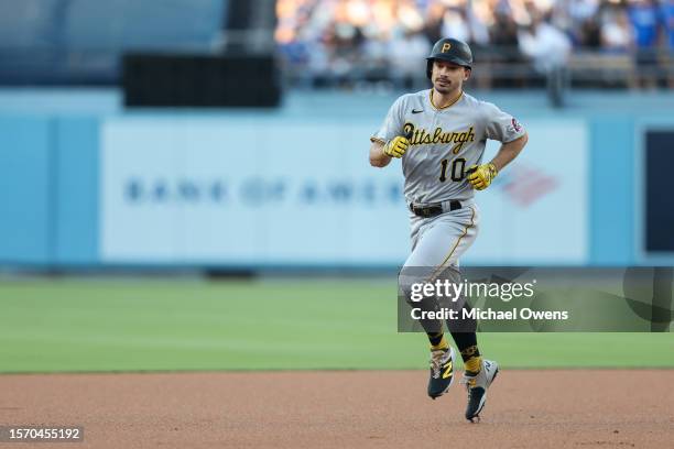 Bryan Reynolds of the Pittsburgh Pirates rounds the bases after hitting a solo home run against the Los Angeles Dodgers during the first inning at...