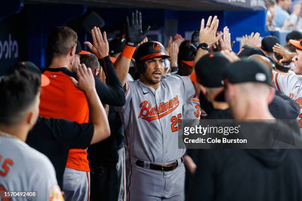 Anthony Santander of the Baltimore Orioles celebrates a grand slam in the eighth inning of their MLB game against the Toronto Blue Jays at Rogers...