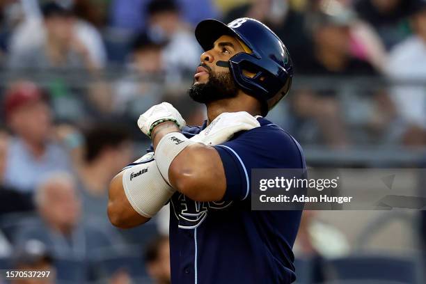 Yandy Diaz of the Tampa Bay Rays reacts after hitting a home run against the New York Yankees during the third inning at Yankee Stadium on August 1,...