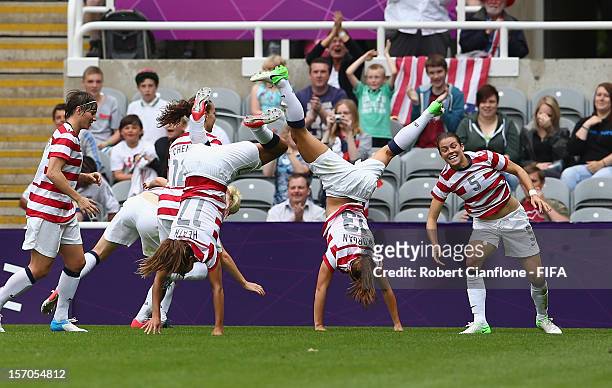 The USA celebrate the goal scored by Abby Wambach during the Women's Football Quarter Final match between United States and New Zealand, on Day 7 of...