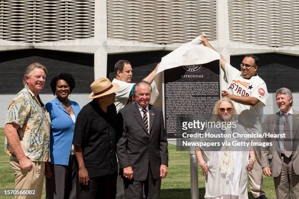 Texas State Historical Marker, honoring the Astrodome, is unveiloed by Mike Vance and Mike Acosta during a ceremony on Tuesday, May 29 in Houston.