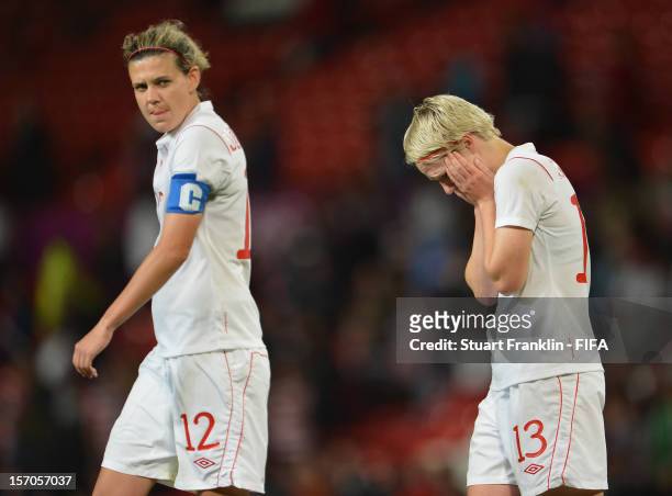 Christie Sinclair and Sophie Schmidt of Canada look dejected during the Women's Football Semi Final match between Canada and USA, on Day 10 of the...