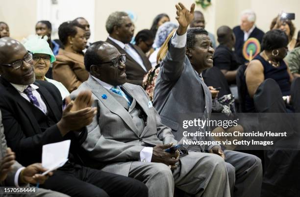 Parisioners listen to a performance by a combined choir of inmates from the Jester 3 and Vance Units at St. Paul Baptist Church for Father's Day on...