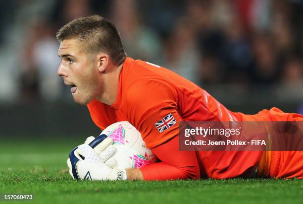 Jack Butland of Great Britain in action during the Men's Football first round Group A Match of the London 2012 Olympic Games between Great Britain...