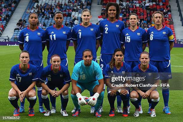 France line up prior to the Women's Football first round Group G Match of the London 2012 Olympic Games between France and Korea DPR at Hampden Park...