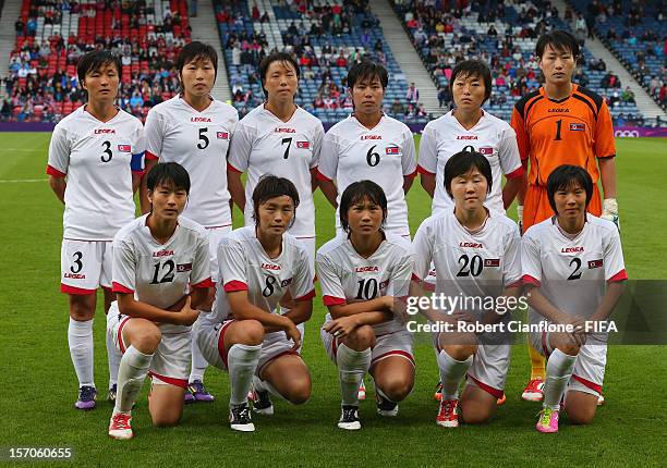 Korea DPR line up prior to the Women's Football first round Group G Match of the London 2012 Olympic Games between France and Korea DPR at Hampden...