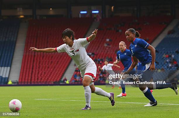 Song Mi Yun of Korea DPR chases the ball during the Women's Football first round Group G Match of the London 2012 Olympic Games between France and...