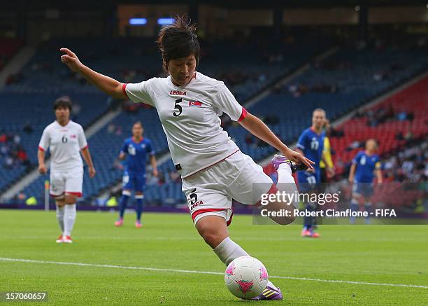 Song Mi Yun of Korea DPR kicks the ball during the Women's Football first round Group G Match of the London 2012 Olympic Games between France and...