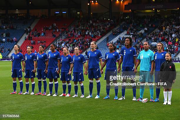 France line up prior to the Women's Football first round Group G Match of the London 2012 Olympic Games between France and Korea DPR at Hampden Park...